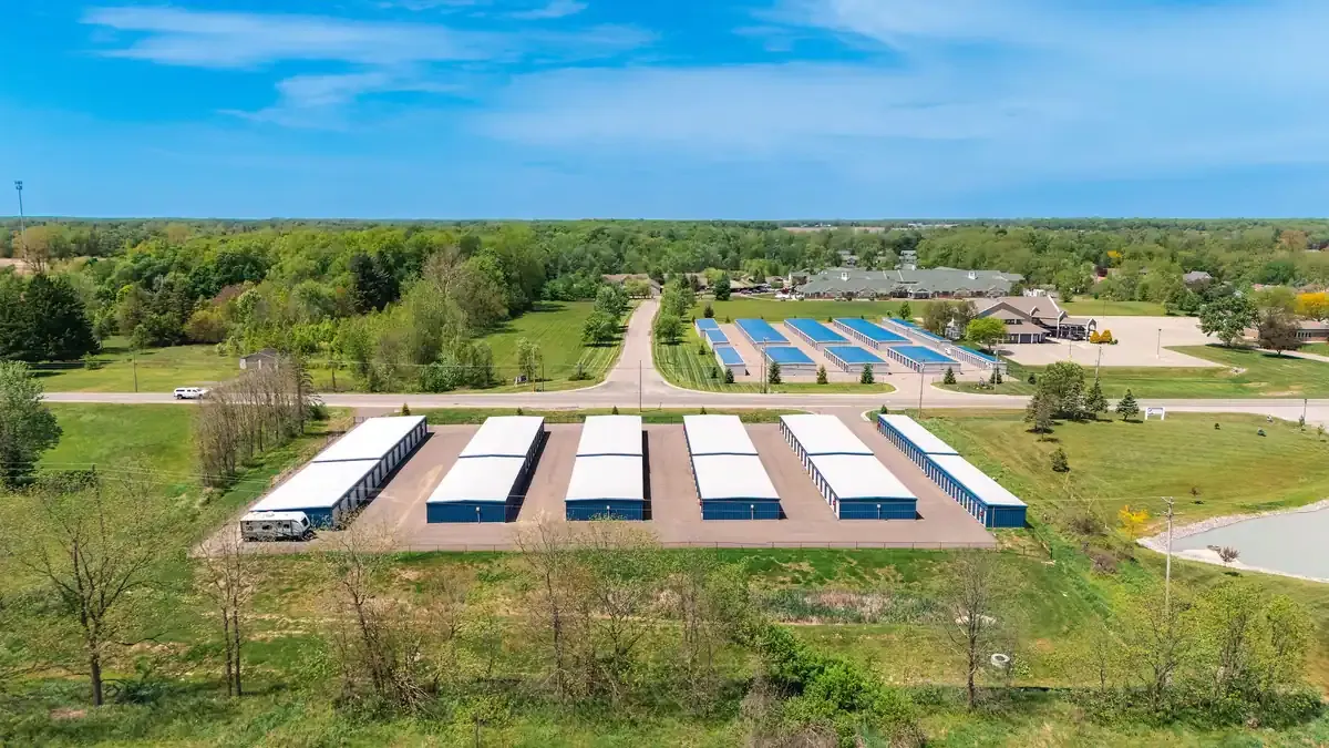 far away drone view of legacy self storage facility 